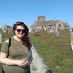 Shannon stands in front of Tintagel church